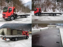 VOLVO FL mit Frontkran und Pritschenaufbau für Traktoren-Transporte.